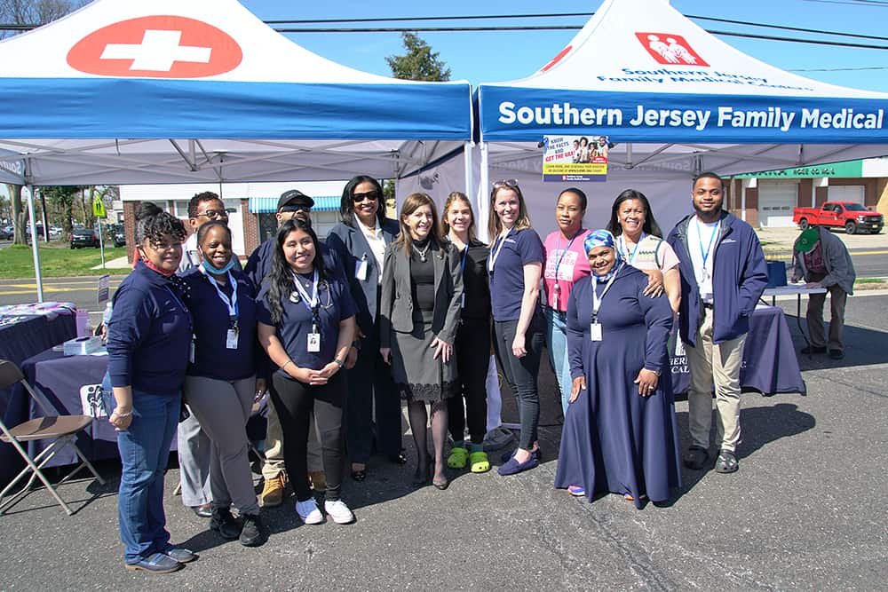 Boost NJ2 - SJFMC team poses with NJ First Lady Tammy Murphy